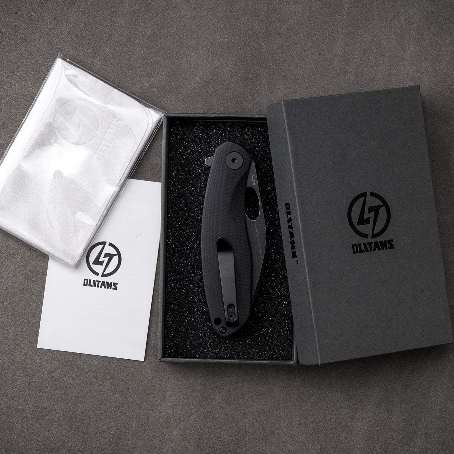 Box image – all black G064 folding knife