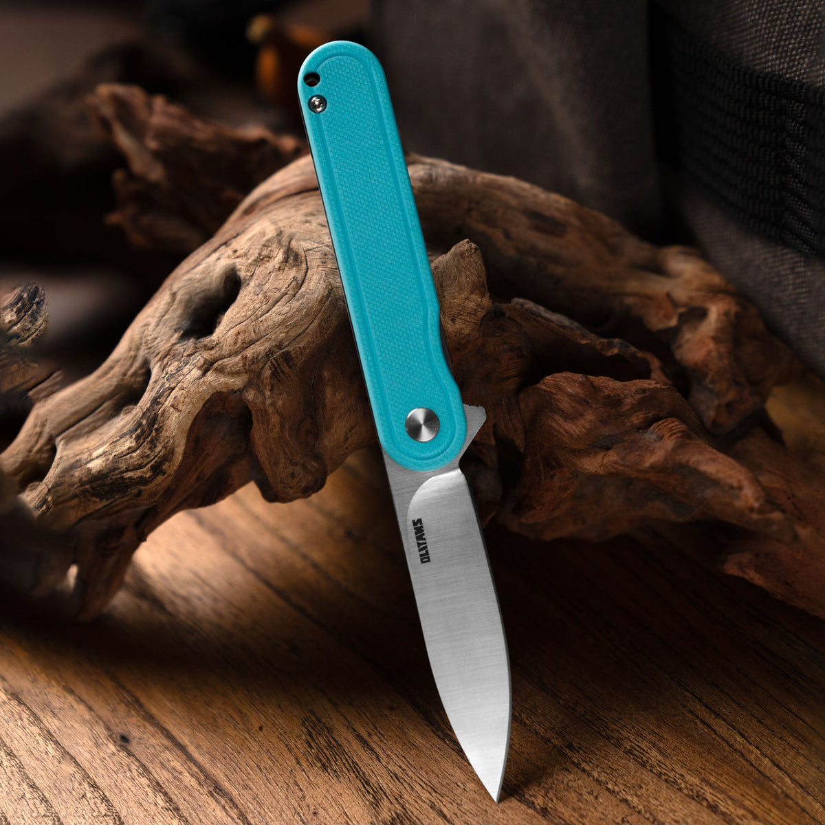 Rocket G040 (2.75''+D2+Cyan G10)-Liner Lock-Flipper